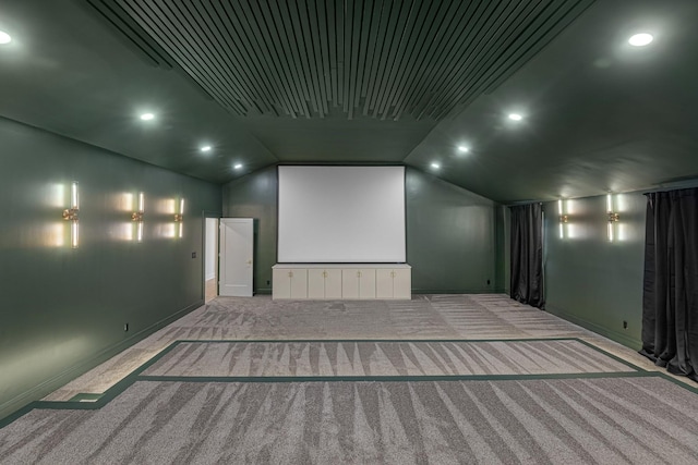 carpeted cinema room with lofted ceiling, baseboards, and recessed lighting