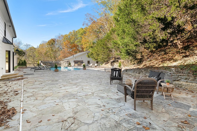 view of patio featuring an outdoor pool