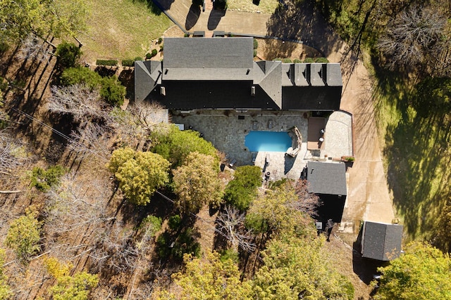 view of subject property featuring a pool