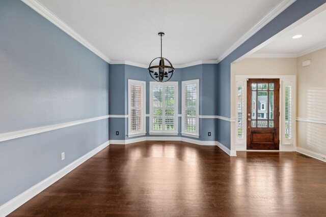 1769 Mayflower Dr, Columbia, TN 38401 - foyer entrance featuring a chandelier, wood finished floors, baseboards, and ornamental molding