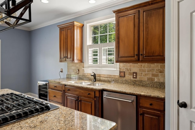 1769 Mayflower Dr, Columbia, TN 38401 - kitchen with a sink, stainless steel appliances, backsplash, ornamental molding, and brown cabinetry