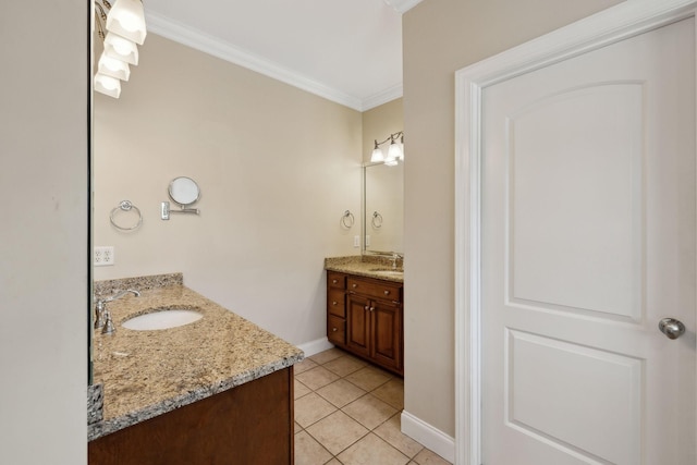 1769 Mayflower Dr, Columbia, TN 38401 - bathroom featuring two vanities, ornamental molding, tile patterned flooring, and baseboards