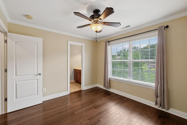 1769 Mayflower Dr, Columbia, TN 38401 - unfurnished bedroom with dark wood finished floors, ornamental molding, baseboards, ceiling fan, and ensuite bath