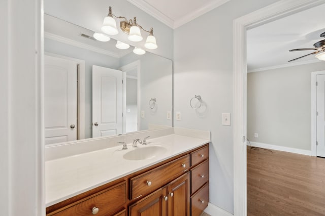 1769 Mayflower Dr, Columbia, TN 38401 - bathroom with vanity, wood finished floors, ornamental molding, a ceiling fan, and baseboards