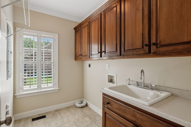 1769 Mayflower Dr, Columbia, TN 38401 - laundry area featuring electric dryer hookup, cabinet space, hookup for a washing machine, baseboards, and ornamental molding
