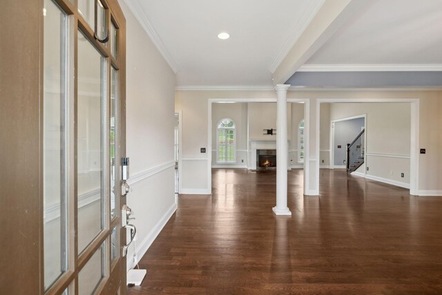 1769 Mayflower Dr, Columbia, TN 38401 - entryway featuring stairway, ornamental molding, wood finished floors, a warm lit fireplace, and baseboards