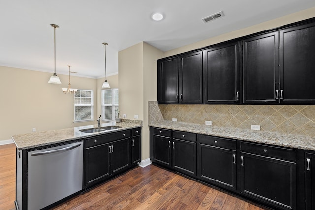 2044 Mainstream Dr, Franklin, TN 37064 - kitchen with dark cabinetry, dishwasher, a sink, a peninsula, and decorative backsplash