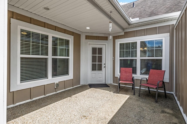 2044 Mainstream Dr, Franklin, TN 37064 - entrance to property featuring board and batten siding, a patio, and roof with shingles