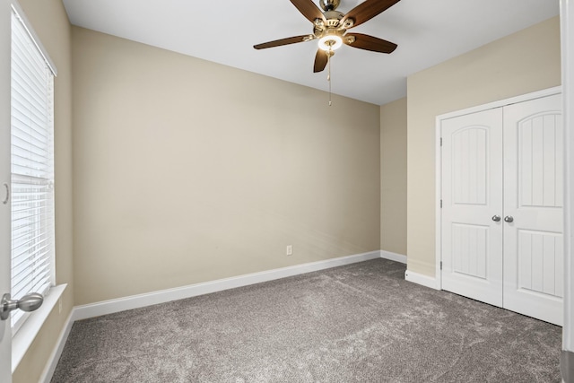 2044 Mainstream Dr, Franklin, TN 37064 - unfurnished bedroom with carpet, baseboards, a closet, and ceiling fan