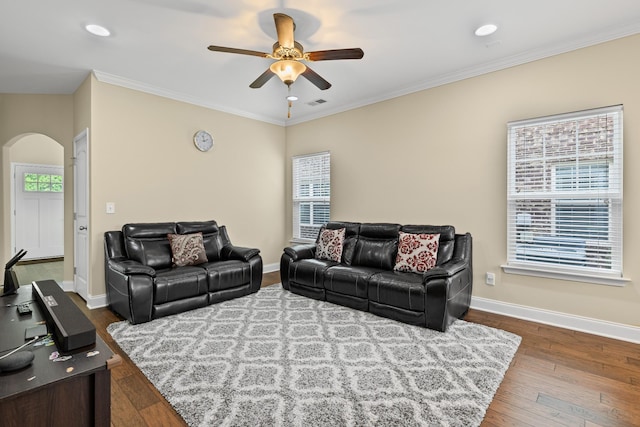 2044 Mainstream Dr, Franklin, TN 37064 - living area featuring arched walkways, ceiling fan, baseboards, dark wood finished floors, and crown molding