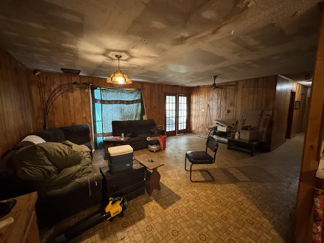 120 Red Bell Rd, Newbern, TN 38059 - living room with wood walls and a ceiling fan