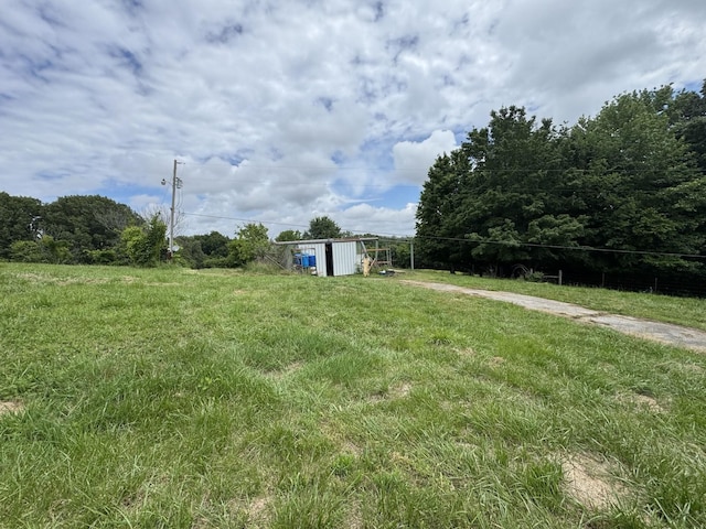 120 Red Bell Rd, Newbern, TN 38059 - view of yard with an outbuilding and a storage shed