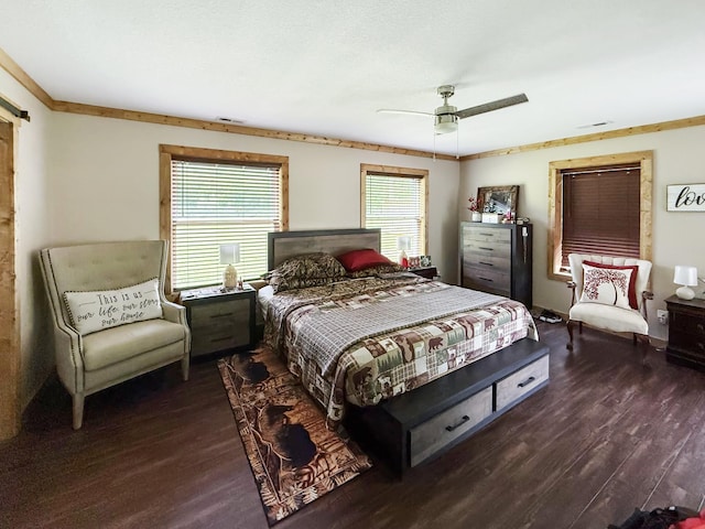 bedroom with wood finished floors and a ceiling fan