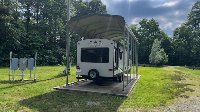 view of parking / parking lot with a carport