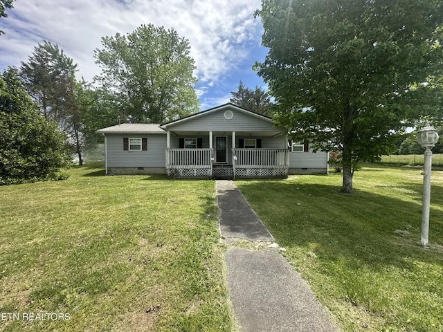 1729 Roslin Rd, Jamestown, TN 38556 - view of front of home featuring crawl space, covered porch, and a front yard