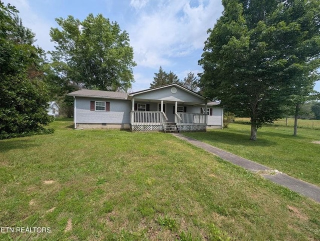1729 Roslin Rd, Jamestown, TN 38556 - view of front of property with covered porch, crawl space, and a front lawn