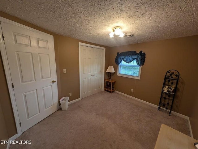 1729 Roslin Rd, Jamestown, TN 38556 - unfurnished bedroom with a closet, carpet floors, and a textured ceiling