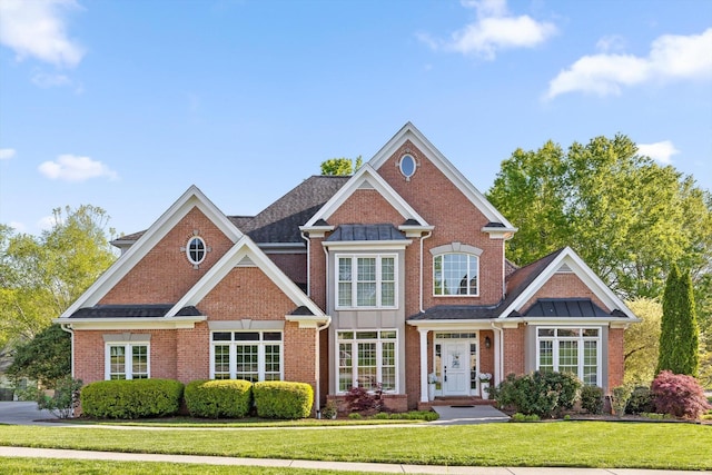 9727 Chestnut Hill Ln, Chattanooga, TN 37421 - view of front of house with a front lawn and brick siding