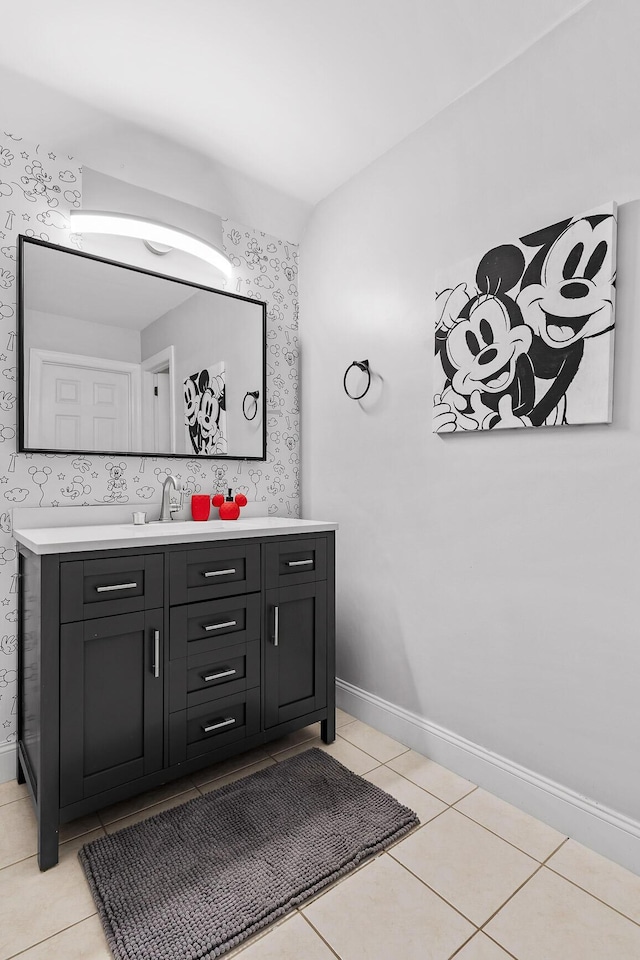 9727 Chestnut Hill Ln, Chattanooga, TN 37421 - bathroom featuring wallpapered walls, double vanity, baseboards, and tile patterned floors