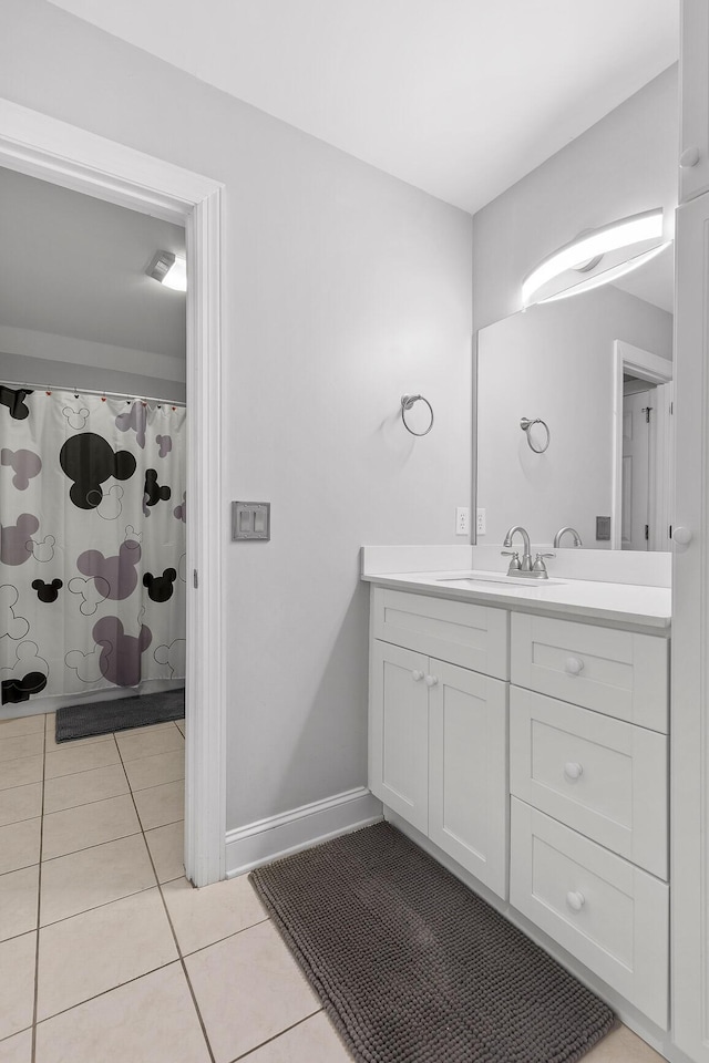 9727 Chestnut Hill Ln, Chattanooga, TN 37421 - bathroom featuring tile patterned flooring, vanity, baseboards, and a shower with shower curtain