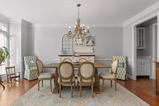 9727 Chestnut Hill Ln, Chattanooga, TN 37421 - dining room with a chandelier, ornamental molding, wood finished floors, and baseboards