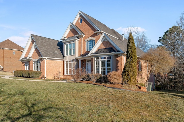 9727 Chestnut Hill Ln, Chattanooga, TN 37421 - view of front of home with brick siding and a front yard