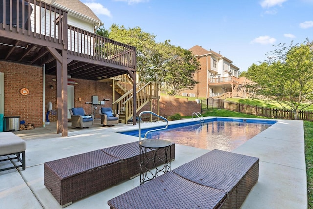 9727 Chestnut Hill Ln, Chattanooga, TN 37421 - view of swimming pool with stairway, a deck, a fenced backyard, and a patio area