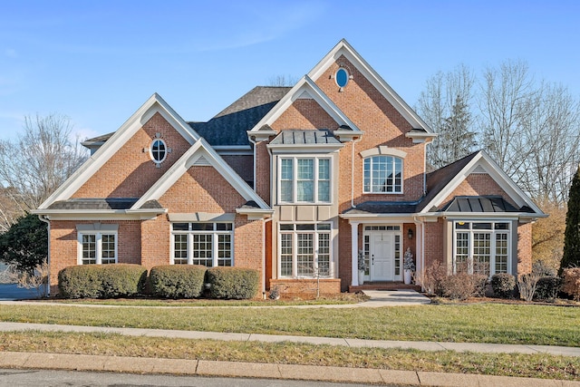 9727 Chestnut Hill Ln, Chattanooga, TN 37421 - view of front of house with brick siding and a front lawn