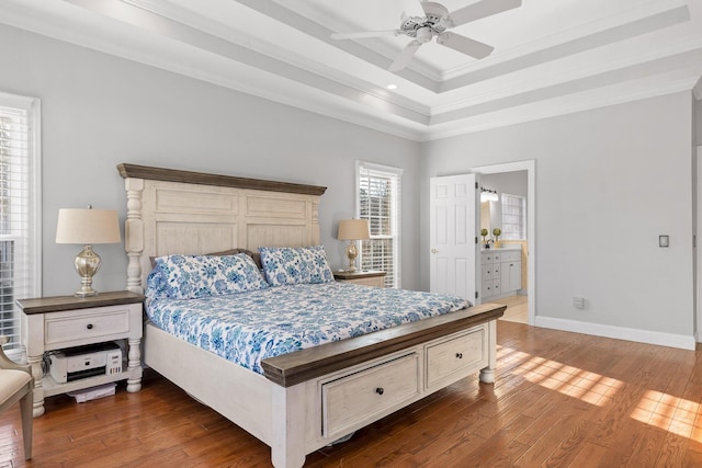 9727 Chestnut Hill Ln, Chattanooga, TN 37421 - bedroom featuring crown molding, wood finished floors, a tray ceiling, baseboards, and a ceiling fan