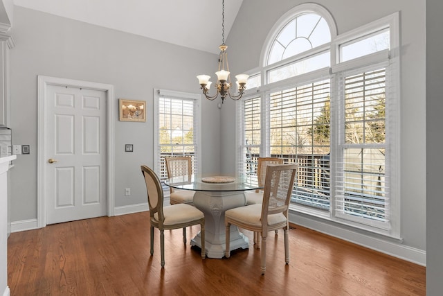 9727 Chestnut Hill Ln, Chattanooga, TN 37421 - dining room featuring a chandelier, baseboards, wood finished floors, and vaulted ceiling
