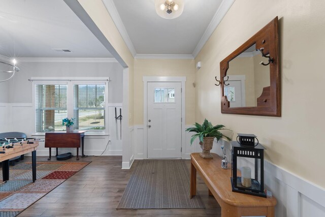 7587 Highborne Ln, Ooltewah, TN 37363 - entrance foyer featuring a wainscoted wall, crown molding, wood finished floors, and a decorative wall