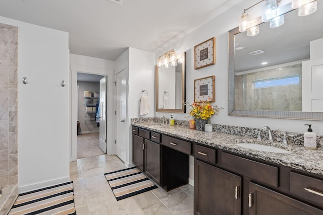7587 Highborne Ln, Ooltewah, TN 37363 - full bath featuring marble finish flooring, walk in shower, double vanity, baseboards, and a spacious closet