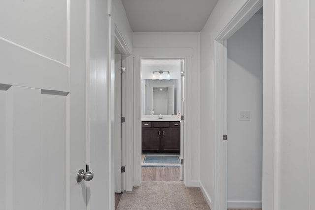 7587 Highborne Ln, Ooltewah, TN 37363 - hall featuring a sink and light carpet