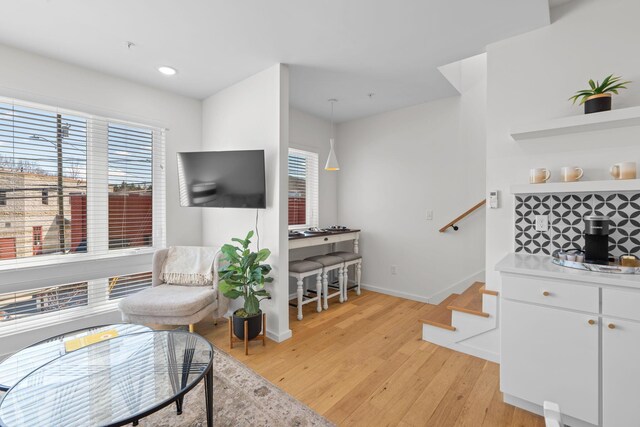 121 Old Mountain Rd, Chattanooga, TN 37409 - living room featuring light wood finished floors, plenty of natural light, stairs, baseboards, and recessed lighting