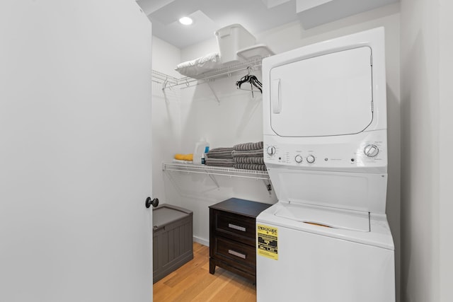 121 Old Mountain Rd, Chattanooga, TN 37409 - washroom with estacked washer and dryer and light wood-style floors