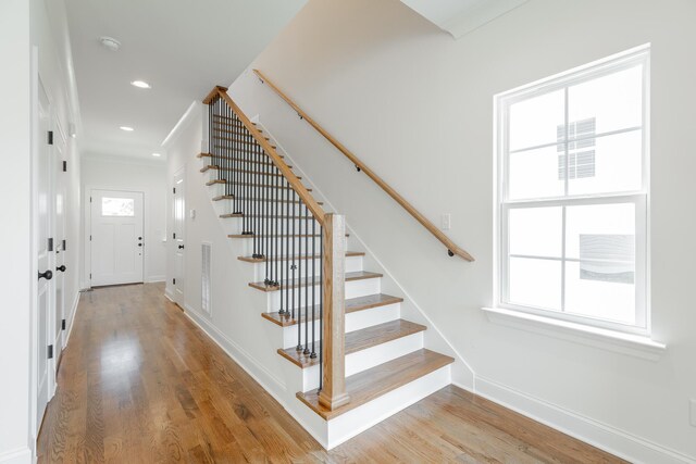 5008 Swan Rd, Chattanooga, TN 37416 - staircase featuring wood finished floors, recessed lighting, and ornamental molding