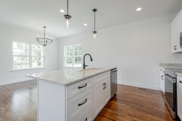 5008 Swan Rd, Chattanooga, TN 37416 - kitchen featuring stainless steel appliances, ornamental molding, dark wood finished floors, white cabinets, and a chandelier