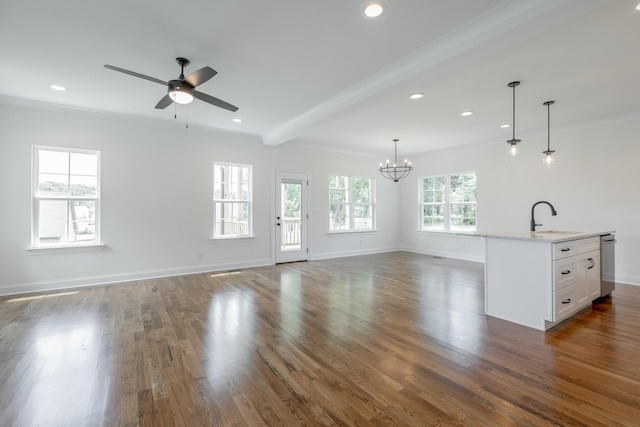 5008 Swan Rd, Chattanooga, TN 37416 - unfurnished living room featuring a chandelier, ceiling fan, wood finished floors, ornamental molding, and recessed lighting