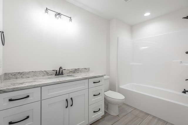 5008 Swan Rd, Chattanooga, TN 37416 - bathroom with vanity, bathtub / shower combination, and wood finished floors