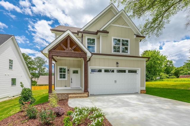 5008 Swan Rd, Chattanooga, TN 37416 - craftsman-style house featuring board and batten siding, driveway, a front yard, and an attached garage