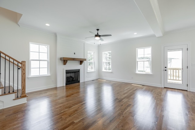 5008 Swan Rd, Chattanooga, TN 37416 - unfurnished living room featuring healthy amount of natural light, a ceiling fan, stairs, wood finished floors, and ornamental molding