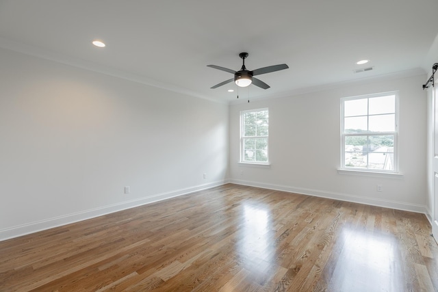 5008 Swan Rd, Chattanooga, TN 37416 - unfurnished room featuring ornamental molding, ceiling fan, recessed lighting, and light wood-type flooring