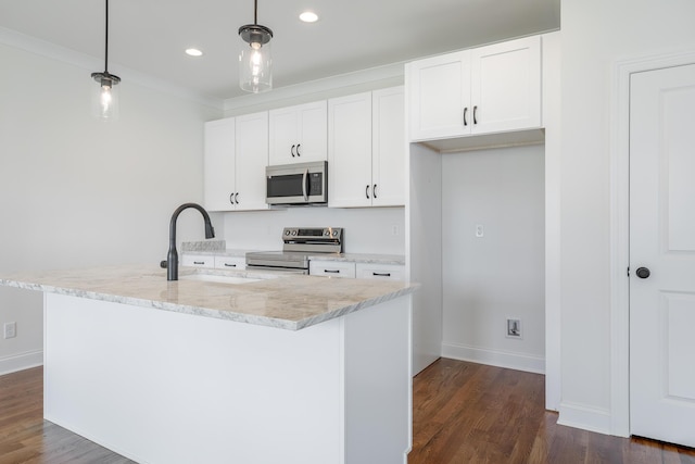 5008 Swan Rd, Chattanooga, TN 37416 - kitchen with appliances with stainless steel finishes, white cabinets, hanging light fixtures, dark wood-style floors, and recessed lighting