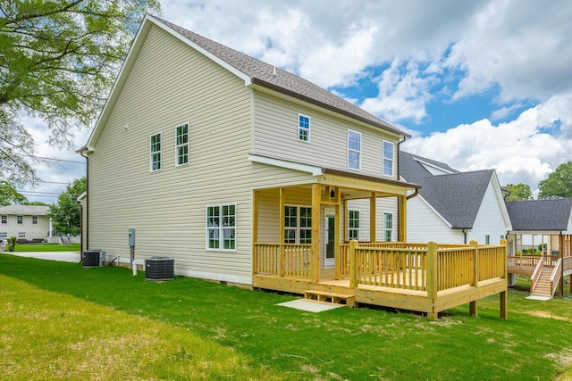 5008 Swan Rd, Chattanooga, TN 37416 - rear view of property featuring a lawn and a wooden deck