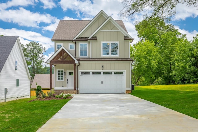 5008 Swan Rd, Chattanooga, TN 37416 - craftsman-style house with board and batten siding, roof with shingles, an attached garage, and a front lawn