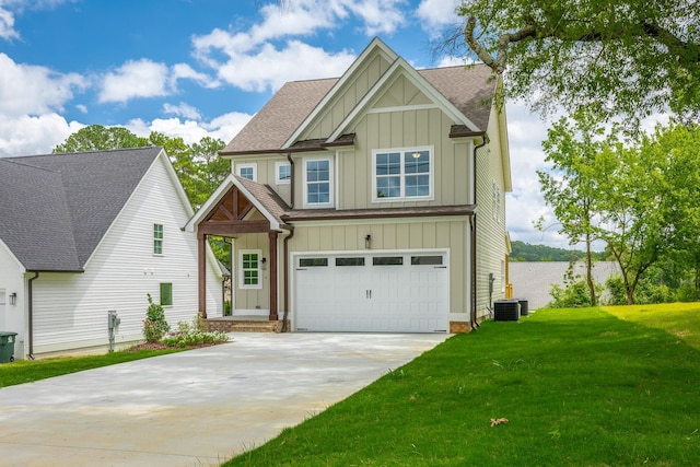 5008 Swan Rd, Chattanooga, TN 37416 - craftsman house featuring board and batten siding, concrete driveway, a shingled roof, and a front yard