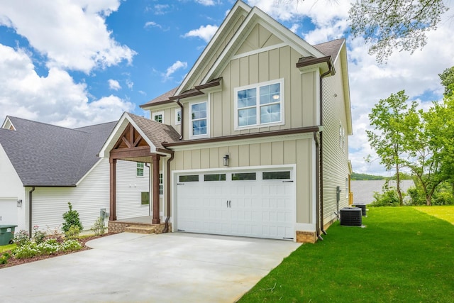 5008 Swan Rd, Chattanooga, TN 37416 - craftsman-style home featuring board and batten siding, concrete driveway, a front lawn, an attached garage, and roof with shingles
