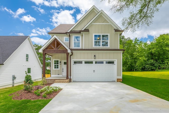 5008 Swan Rd, Chattanooga, TN 37416 - craftsman-style house with board and batten siding, an attached garage, a front yard, and driveway