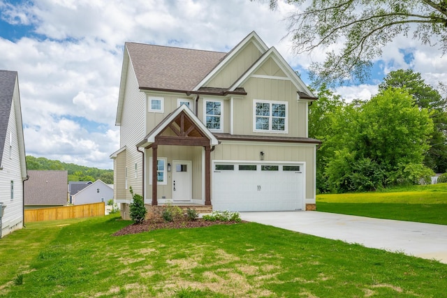 5008 Swan Rd, Chattanooga, TN 37416 - craftsman-style home featuring driveway, board and batten siding, an attached garage, and a shingled roof