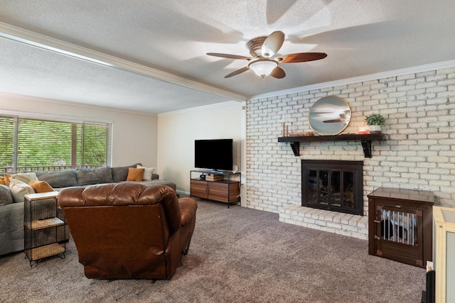 carpeted living area featuring crown molding, ceiling fan, a textured ceiling, and a fireplace
